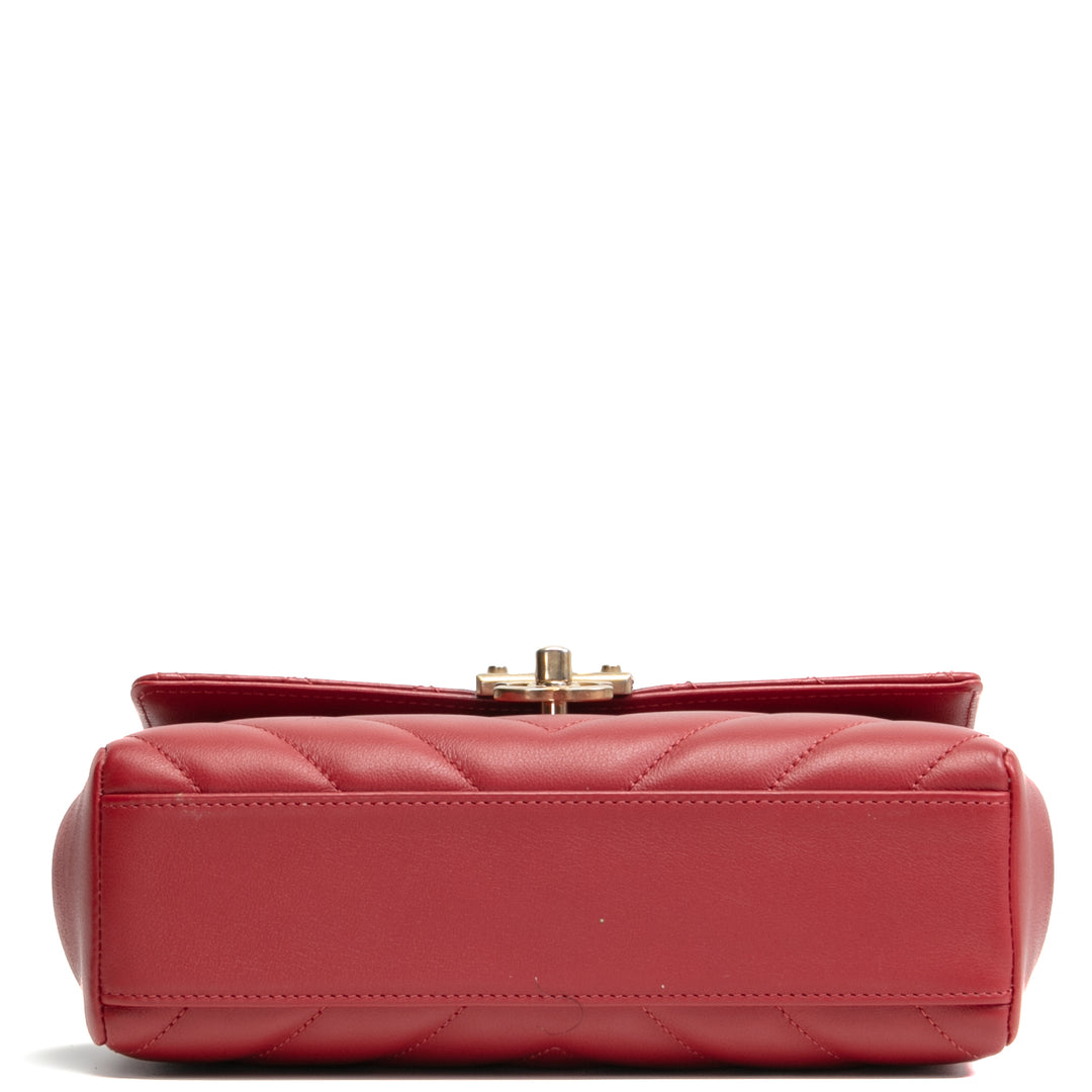 Bolsa de colgajo de mango superior de Chanel en la ciudad - rojo