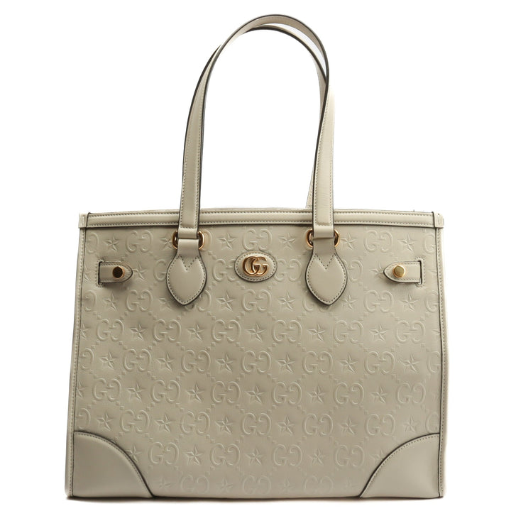 Gucci GG Star en relieve Media Tote con bolsa - marfil