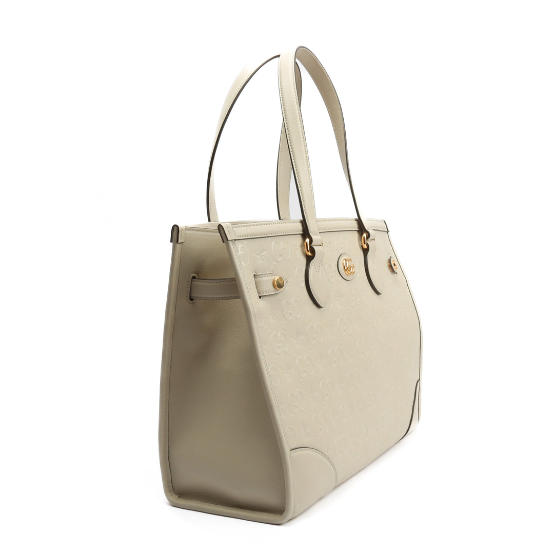 Gucci GG Star en relieve Media Tote con bolsa - marfil